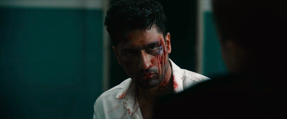 Imran, bloodied, at the parcel line