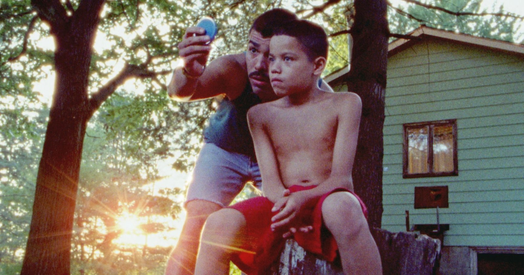 A father and his young son outdoors