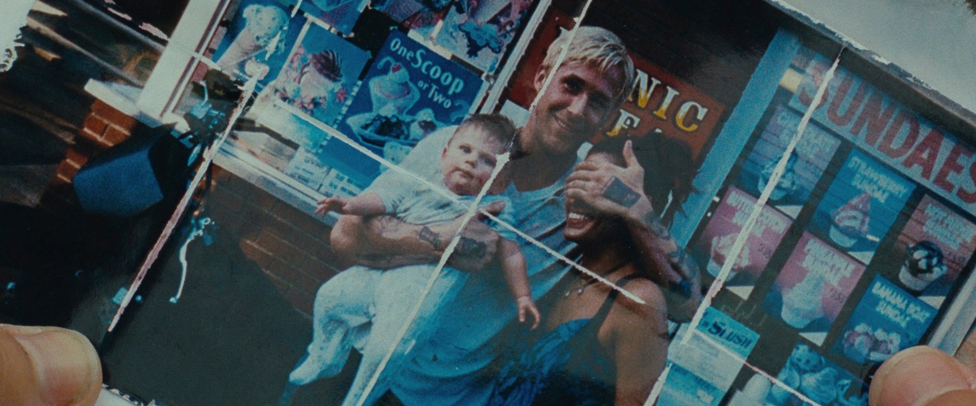 A scratched photograph of his family
