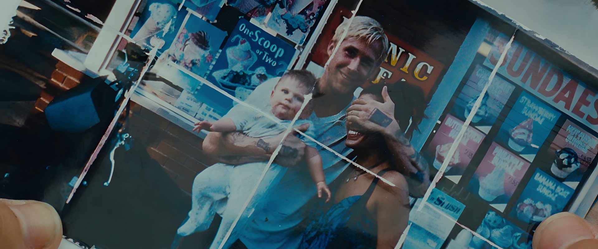 A torn photograph of his family