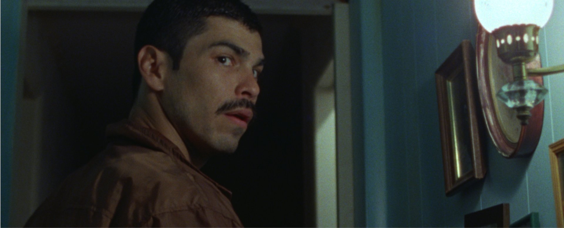 Raul turning to look back over his shoulder