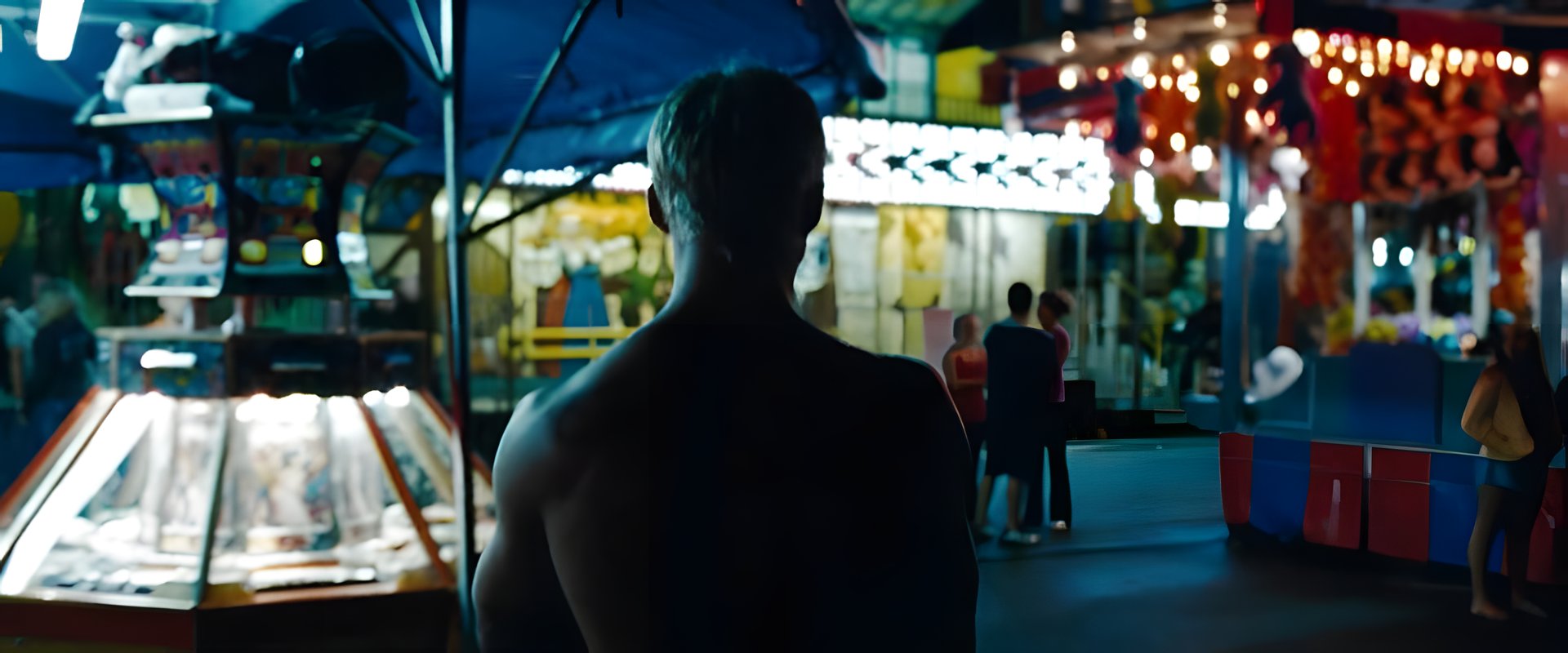 A neon-lit fairground at night
